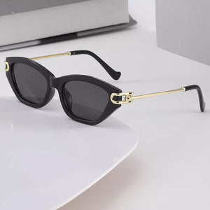 PC Frame material: Metal-plastic hybrid Lens material: Polycarbonate Temple mate sunglasses in Black with cat-eye silhouette