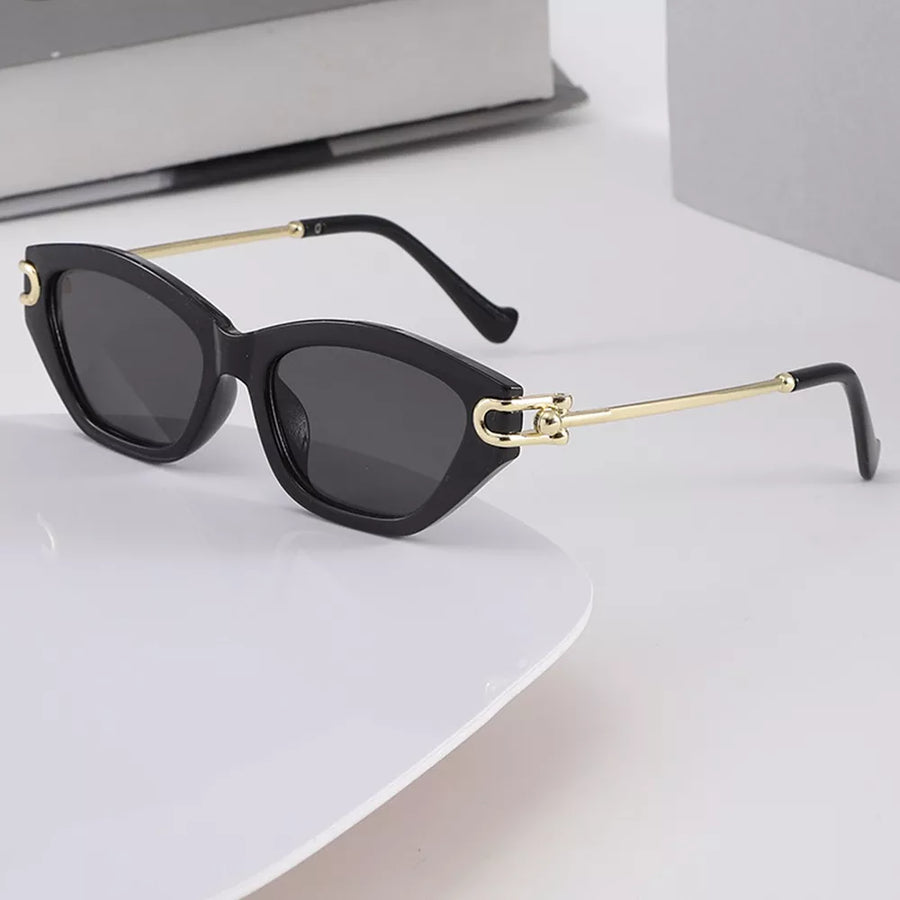 PC Frame material: Metal-plastic hybrid Lens material: Polycarbonate Temple mate sunglasses in Black with cat-eye silhouette