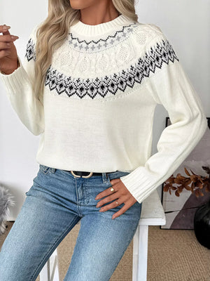 White Fair Isle knit sweater with crew neck and cable knit details.