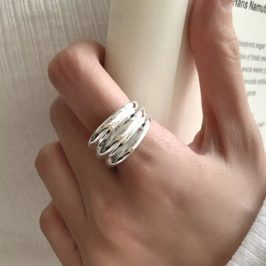 silver ring with textured and n/a