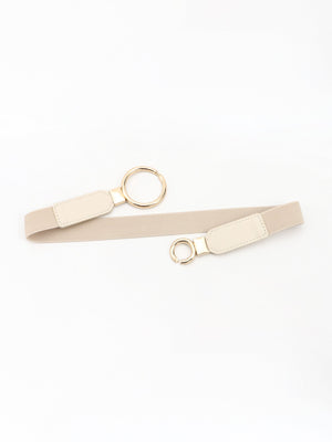 Interlocked ring elastic waist belt in tan with gold hardware and faux leather accents.