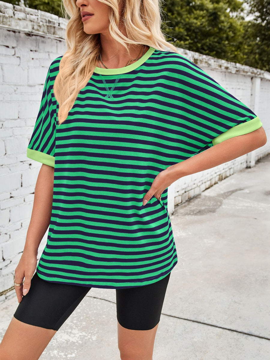 Striped Breton tee with navy and green stripes and lime green trim.
