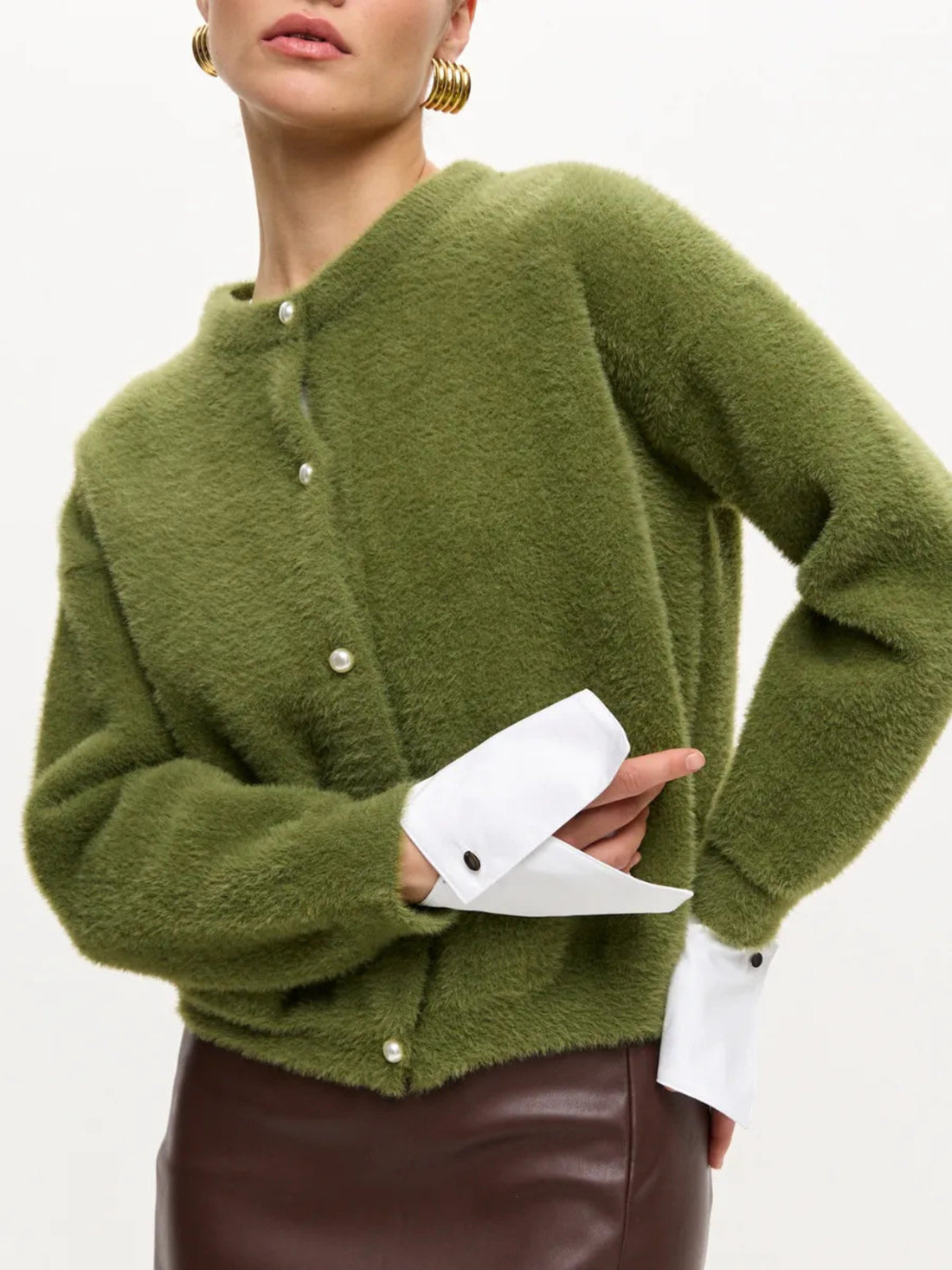cardigan in olive green featuring buttoned and relaxed fit