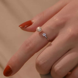 Freshwater Pearl,925 sterling silver,Zircon Care instructions: Avoid wearing dur ring in Silver with open band silhouette