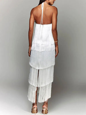 White halter neck maxi dress with tiered fringe detail and open back.