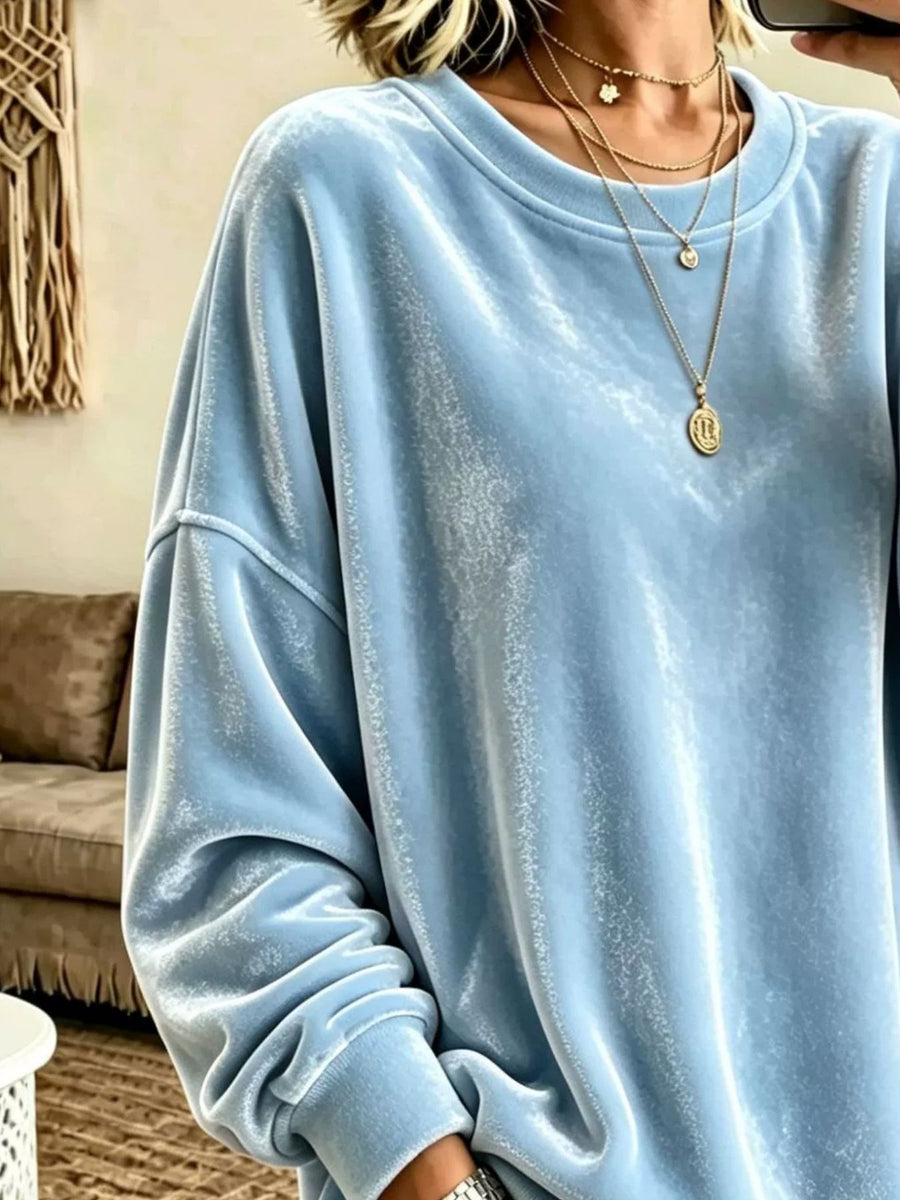100% polyester Care instructions: Machine wash cold sweatshirt in Pink with loose silhouette