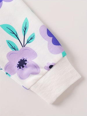 Baby top and bottom set with white fabric and purple floral print, featuring a ribbed cuff.