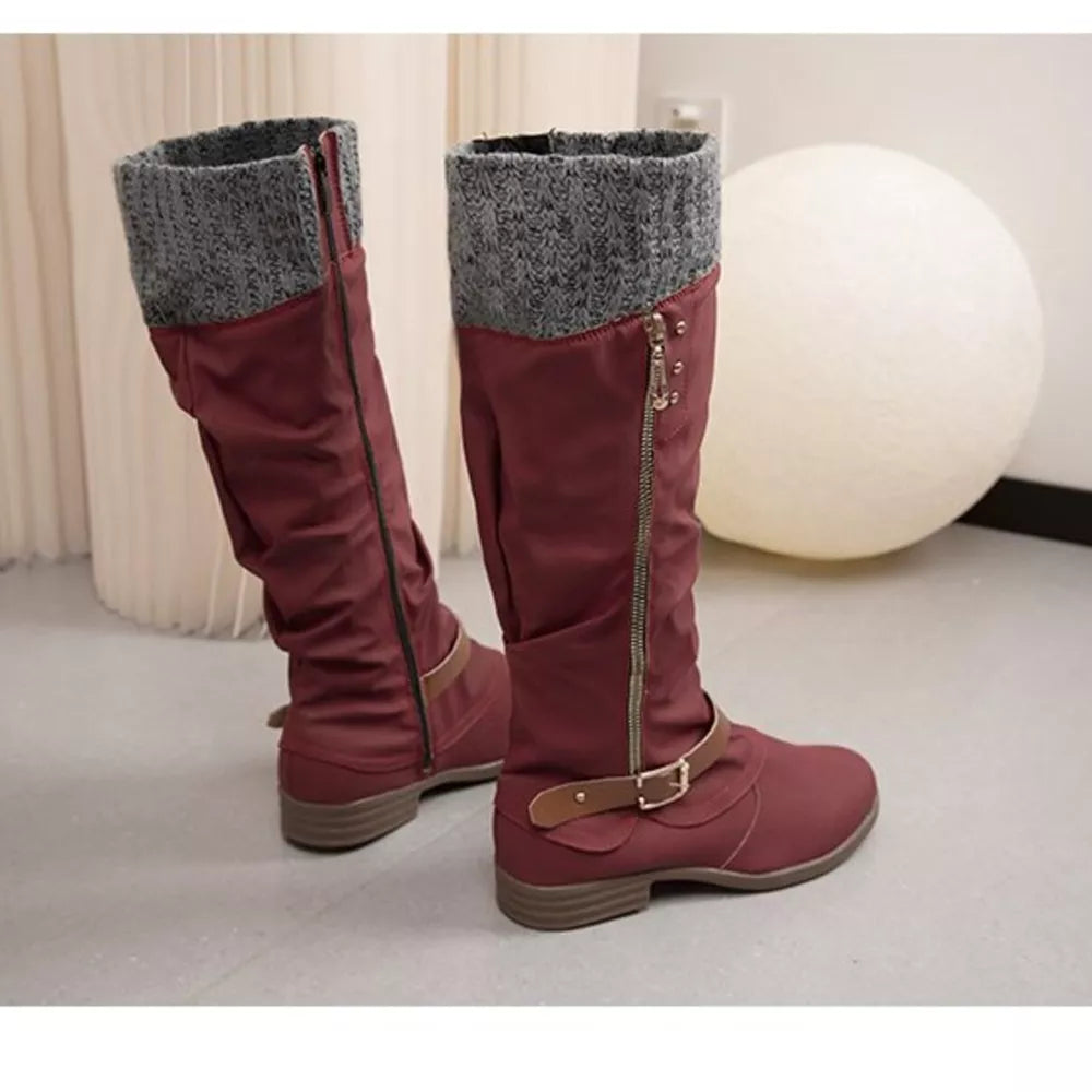 Burgundy suede slouch knee-high boots with knit cuff and side zipper detail.