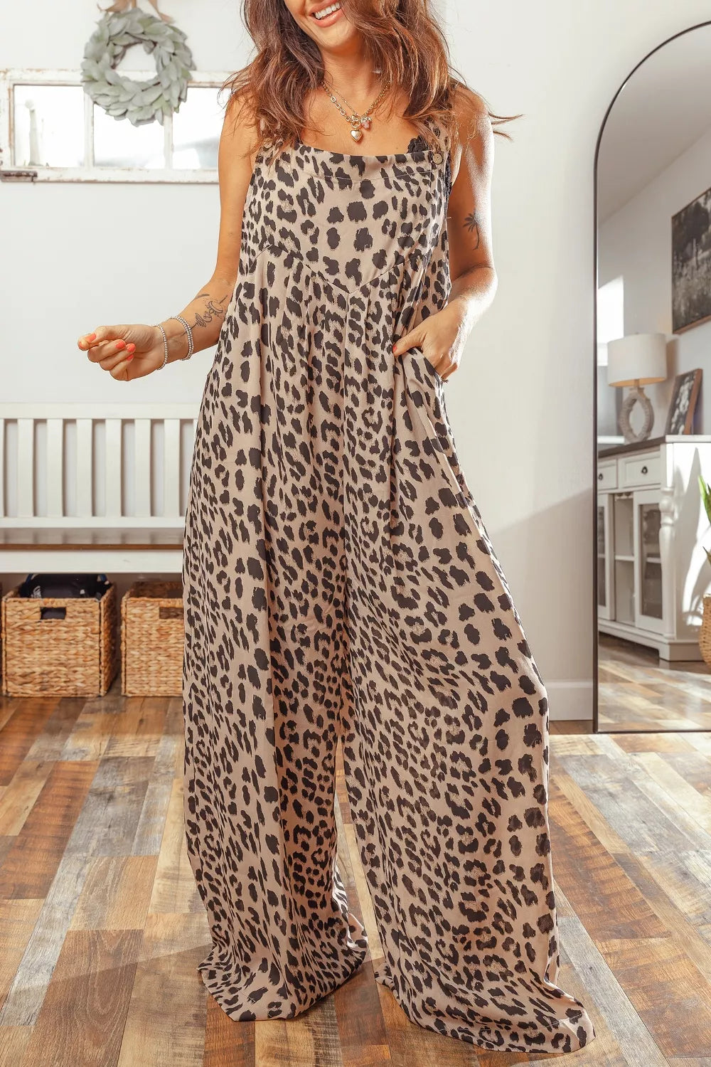 Chic leopard print wide-leg cotton jumpsuit with pockets.