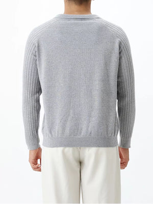 Light gray cotton knit polo top with ribbed sleeves and collar.
