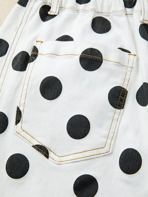 White denim jeans with black polka dots and a back pocket detail.