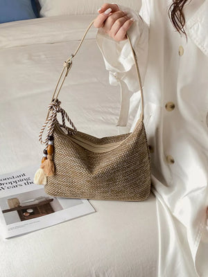 Woven Small Shoulder Bag With Tassel in Sky Blue with tassel detail