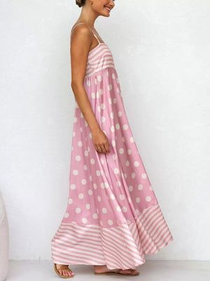 Blush pink maxi dress with polka dot print and striped hem, spaghetti straps