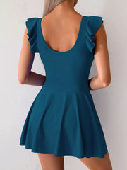 Peacock blue ruffled sleeve asymmetric swim dress with a flared skirt.