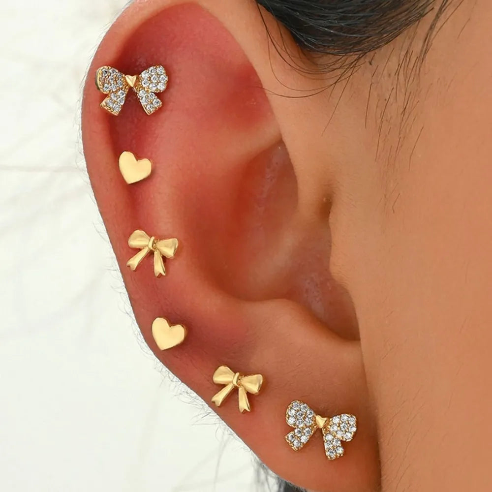gold earrings with motif and not applicable