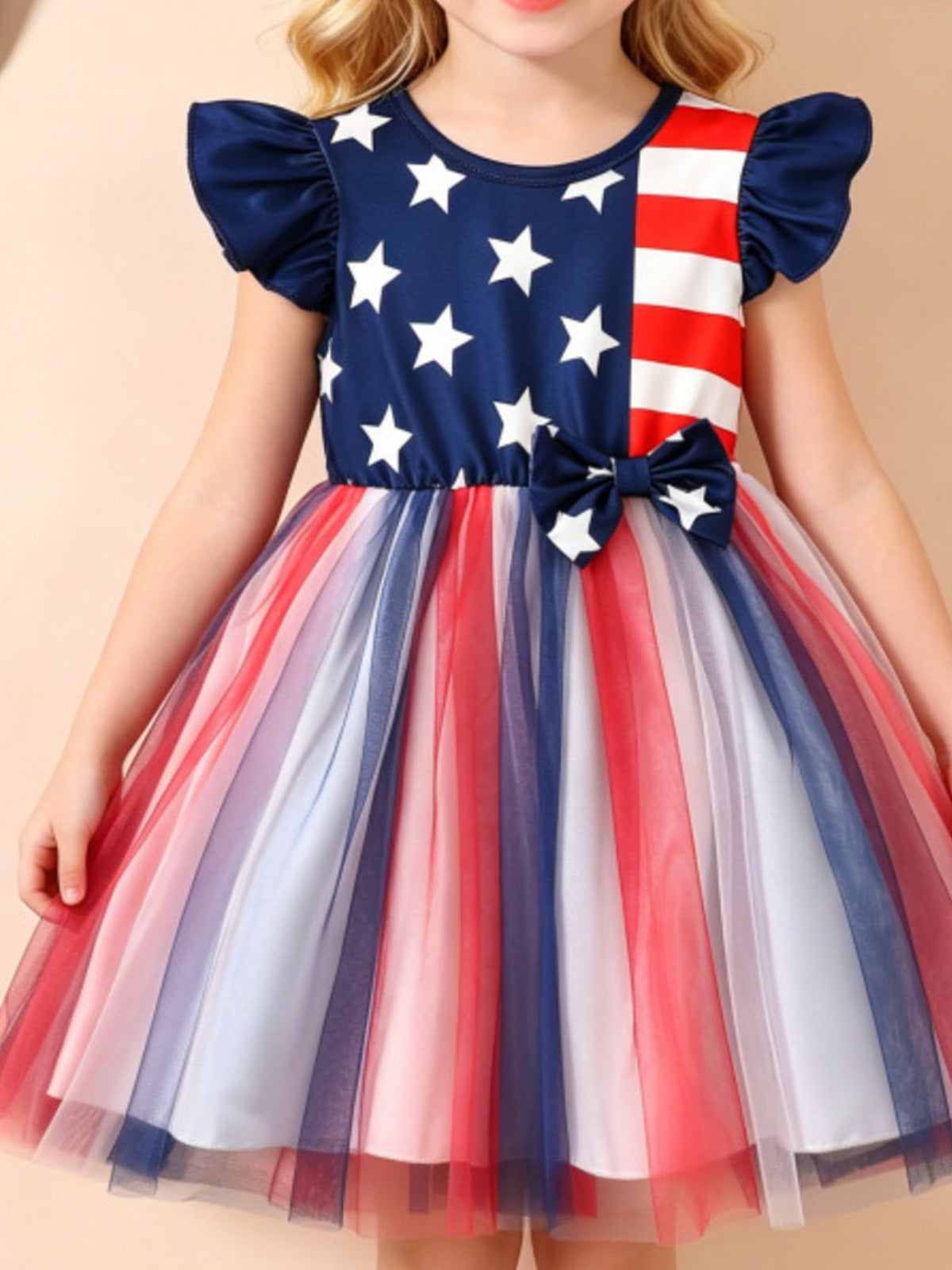 Patriotic star-spangled tulle dress with bow, blue, red, white stripes and stars.