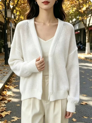 Pastel Yellow cardigan with hip-length and button-front