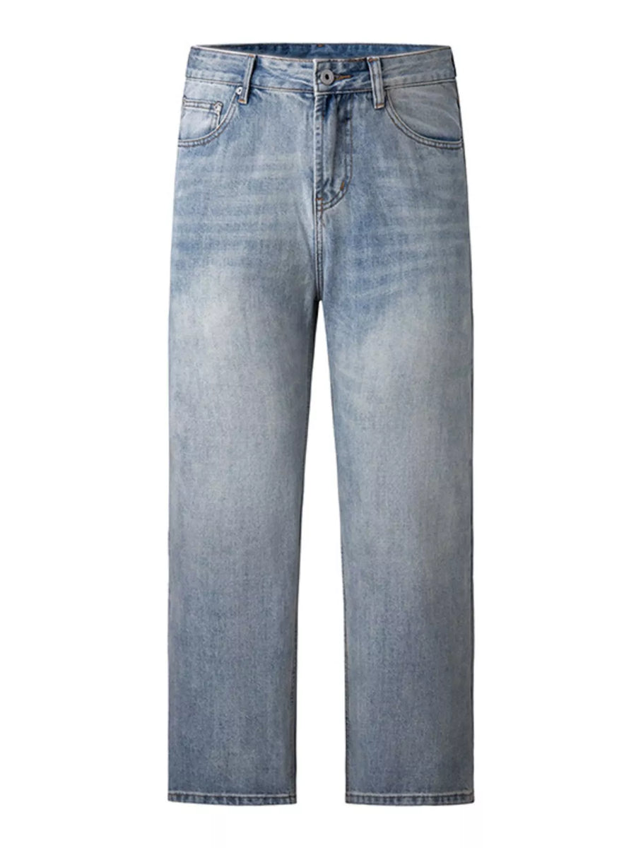 Men's relaxed fit light blue wash denim jeans with a straight leg cut.