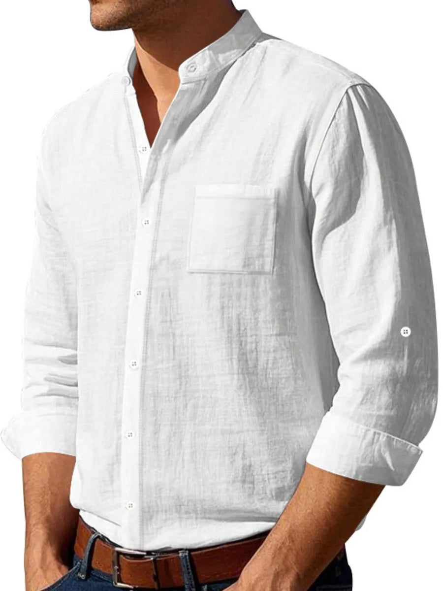 White linen relaxed fit shirt with mandarin collar and chest pocket.