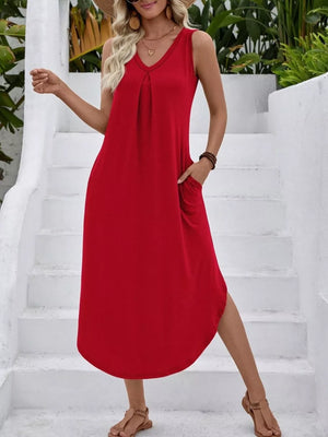 Sleeveless V-neck midi dress in deep red cotton with pockets and side slits.