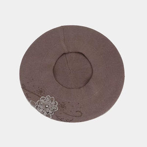 hat featuring floral in black with polyester Imported Size &amp texture