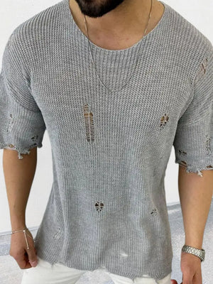 Gray open-knit destroyed crewneck tee with distressed details and short sleeves.