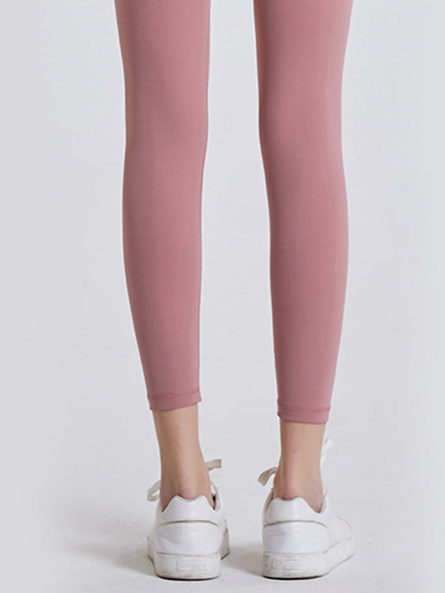 FlexFit 7/8 leggings in Dusty Pink with a wide waistband, paired with white sneakers.