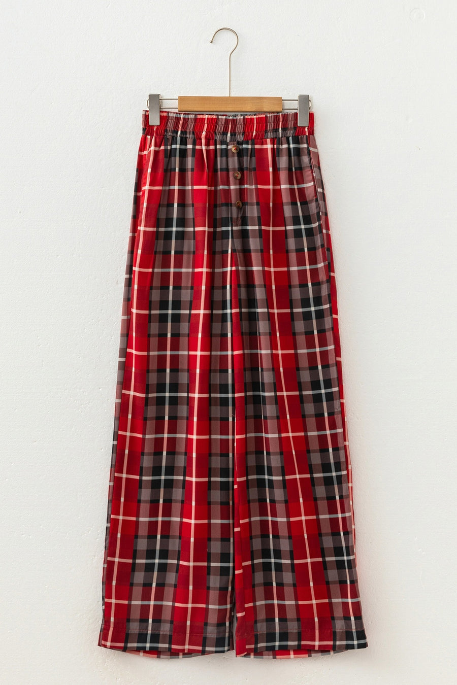 pants featuring plaid in black with 100% polyester Care instructions: Machine wash cold texture