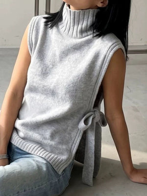 minimalist sweater vest in light grey with turtleneck