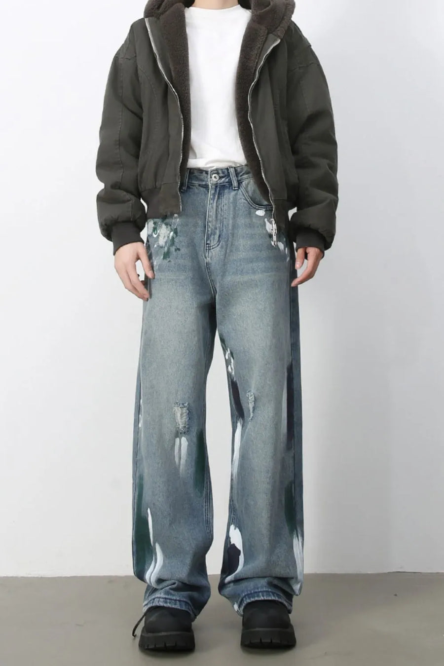 Ink-Blot Wide Leg Denim jeans in medium wash with abstract paint splatters and distressed details.