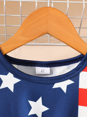 Baby dress with patriotic stars and stripes pattern, blue cotton blend fabric.