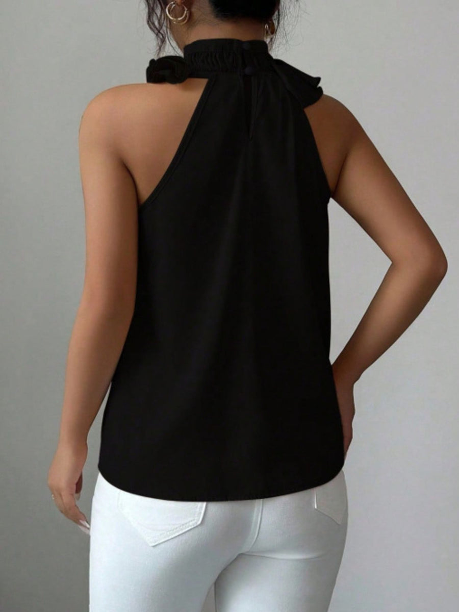 Black ruffled high neck sleeveless top with button closure at back neck