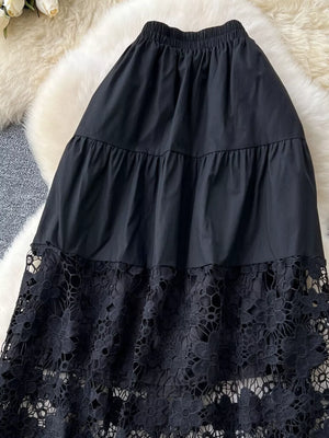 Black tiered skirt with elastic waist and intricate lace hem detail