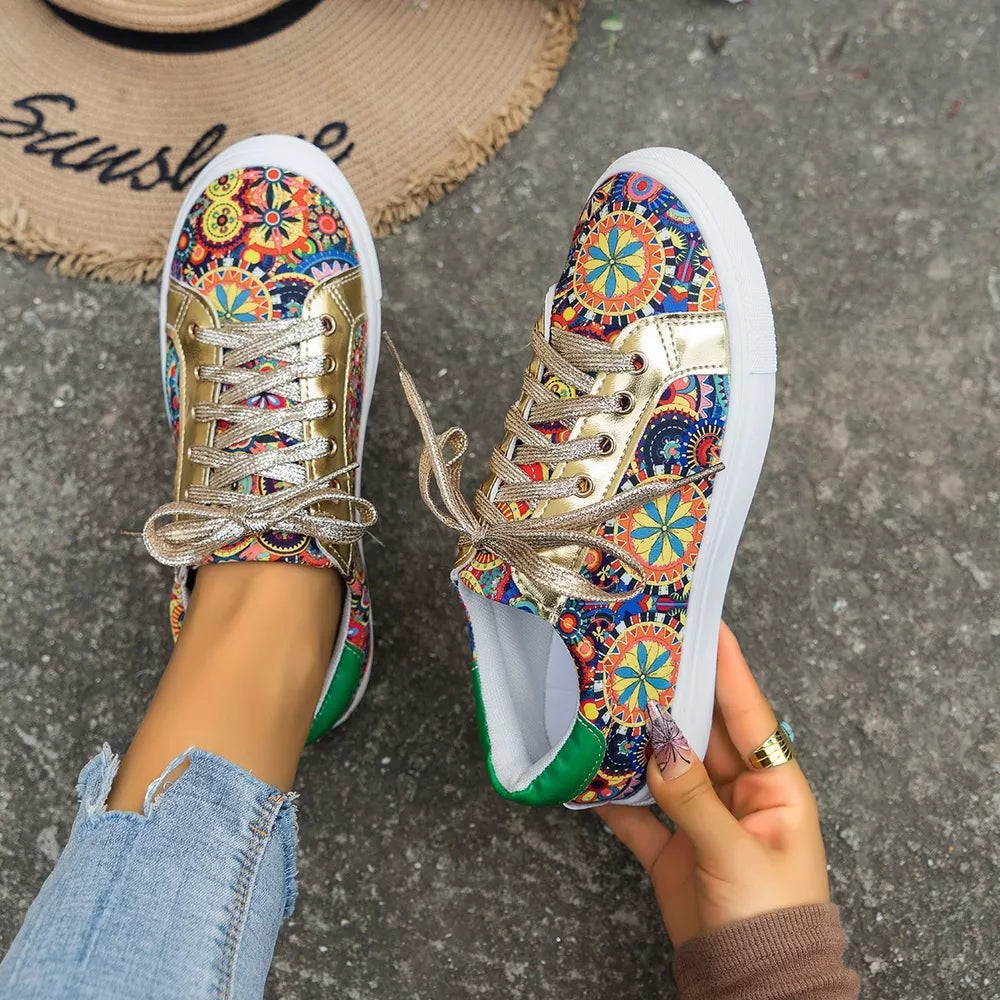 Mandala print round toe sneakers with gold accents and green heel detail.