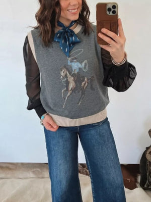 Gray cotton knit vest with cowboy graphic and cream trim, crew neck, sleeveless.