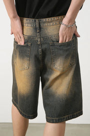 Two-tone washed denim bermuda shorts in olive brown with a faded effect.