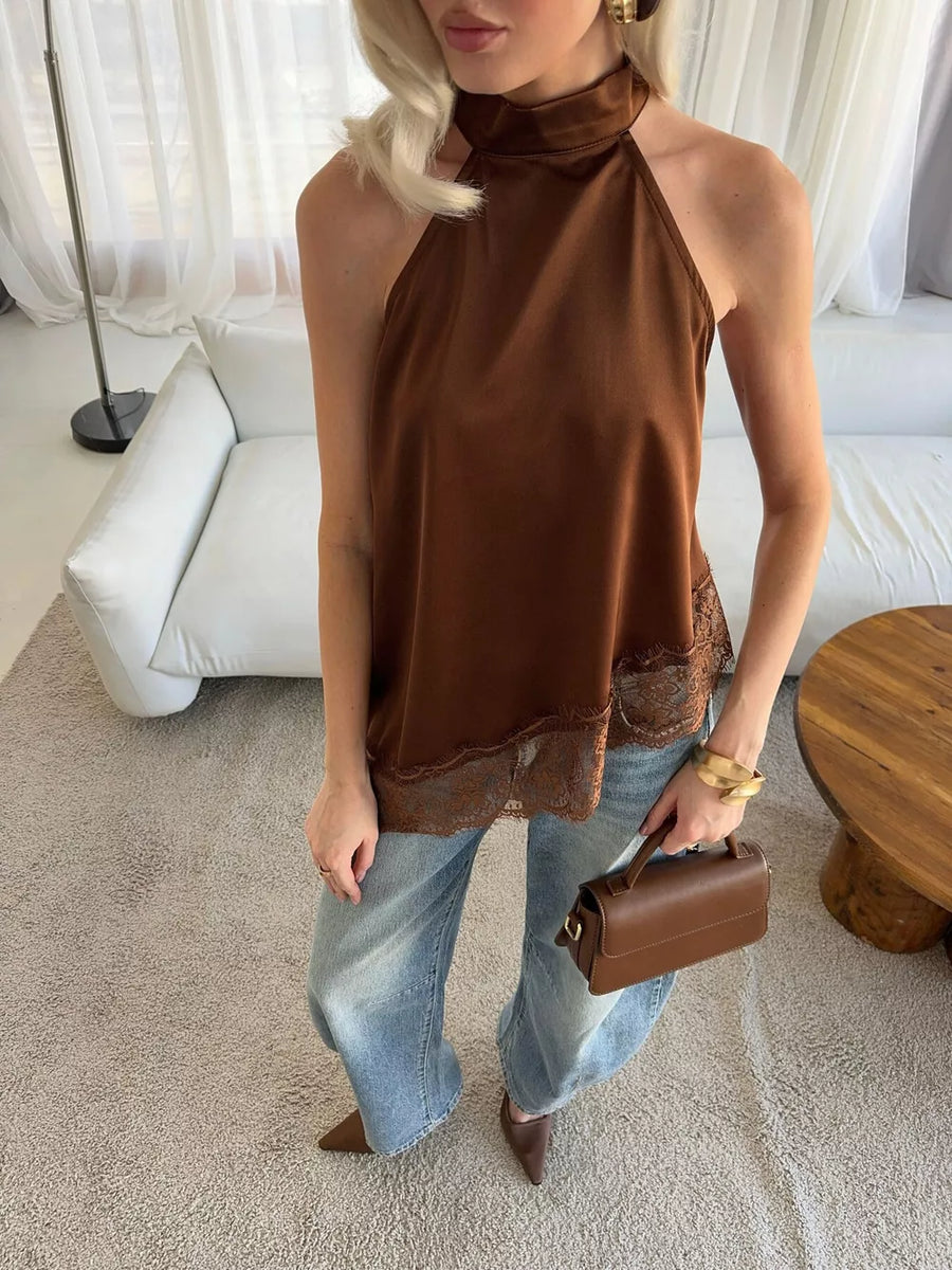 97% polyester, 3% spandex Care instructions: Machine wash cold camisole in chocolate brown with relaxed silhouette