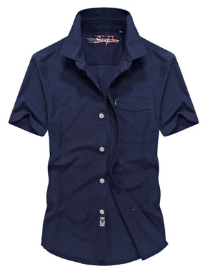 Men's dark blue short sleeve button-down shirt with pocket and cotton fabric.