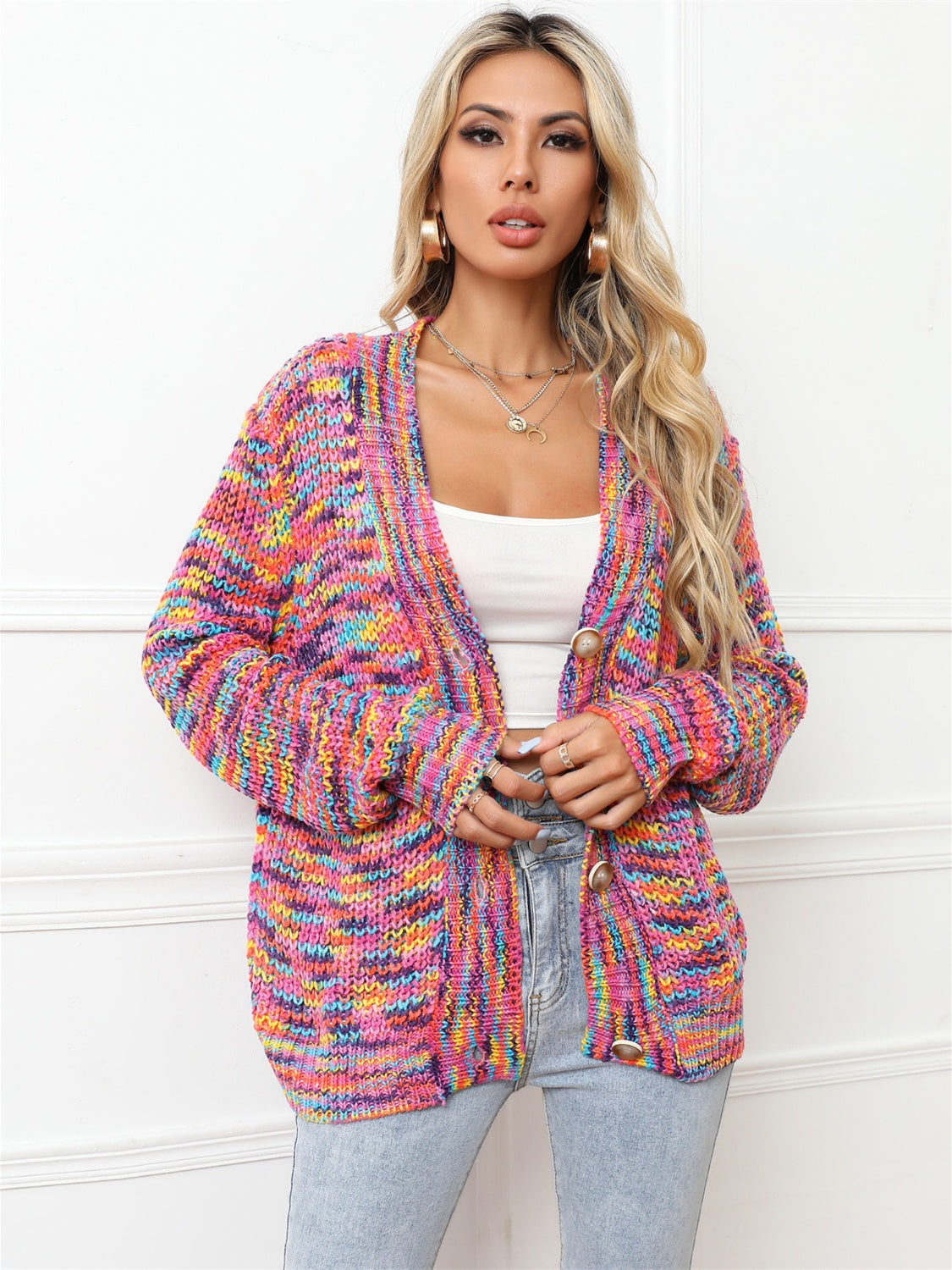 Multicolor knit cardigan with button front, V-neck, and long sleeves.