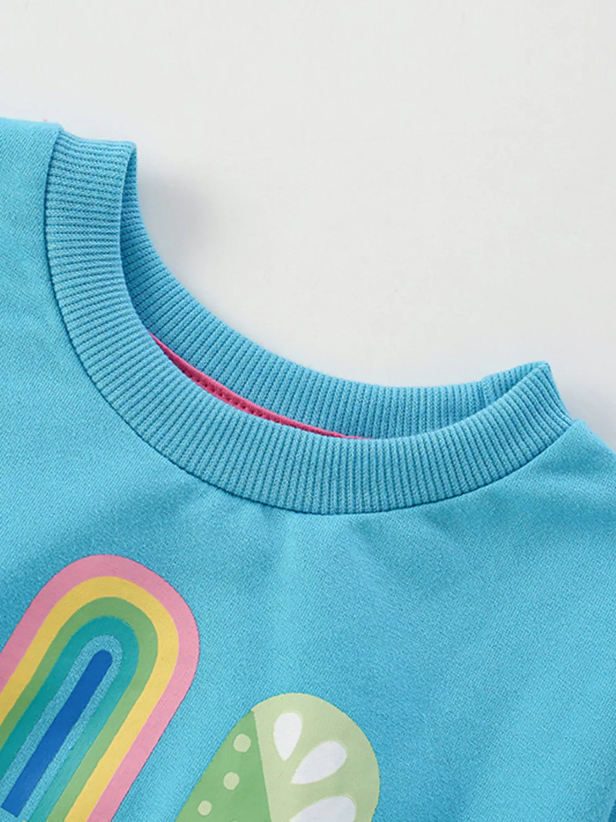 Baby blue cotton sweatshirt with ice cream and rainbow graphic, round neck