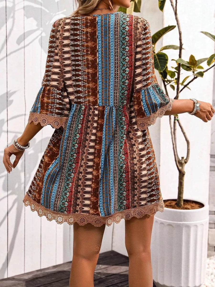 Bohemian printed v-neck dress with bell sleeves and lace trim