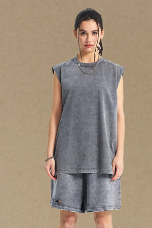 Acid wash relaxed fit tank top in dark gray with a crew neck and sleeveless design.