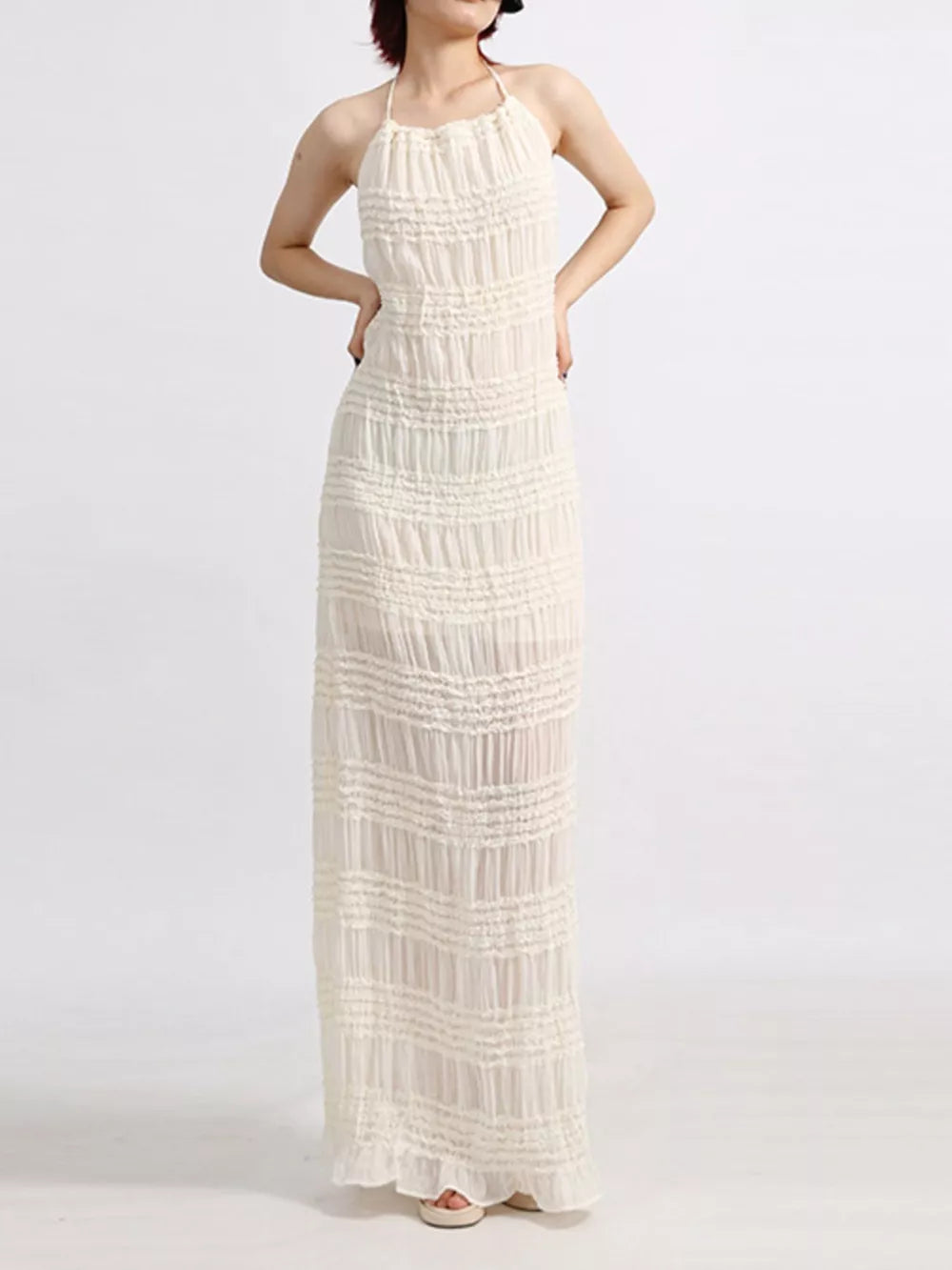 Cream ruched halter maxi dress with ruffled hem