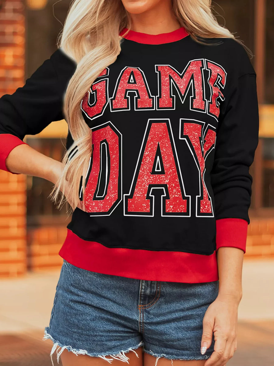 Black sweatshirt with red GAME DAY varsity graphic and red trim