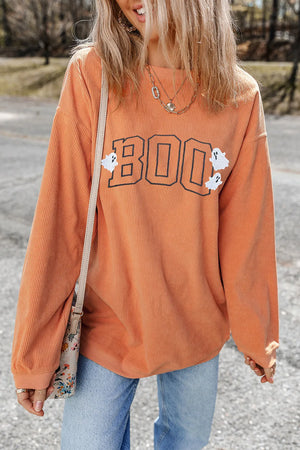 Orange corduroy sweatshirt with "Boo" appliqué and ghost details.