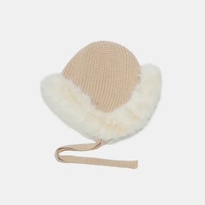 Faux fur trim trapper hat in beige knit with ivory trim and ties.