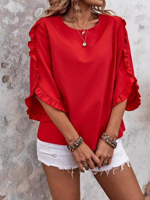 Red ruffled sleeve blouse with button detail and round neckline.