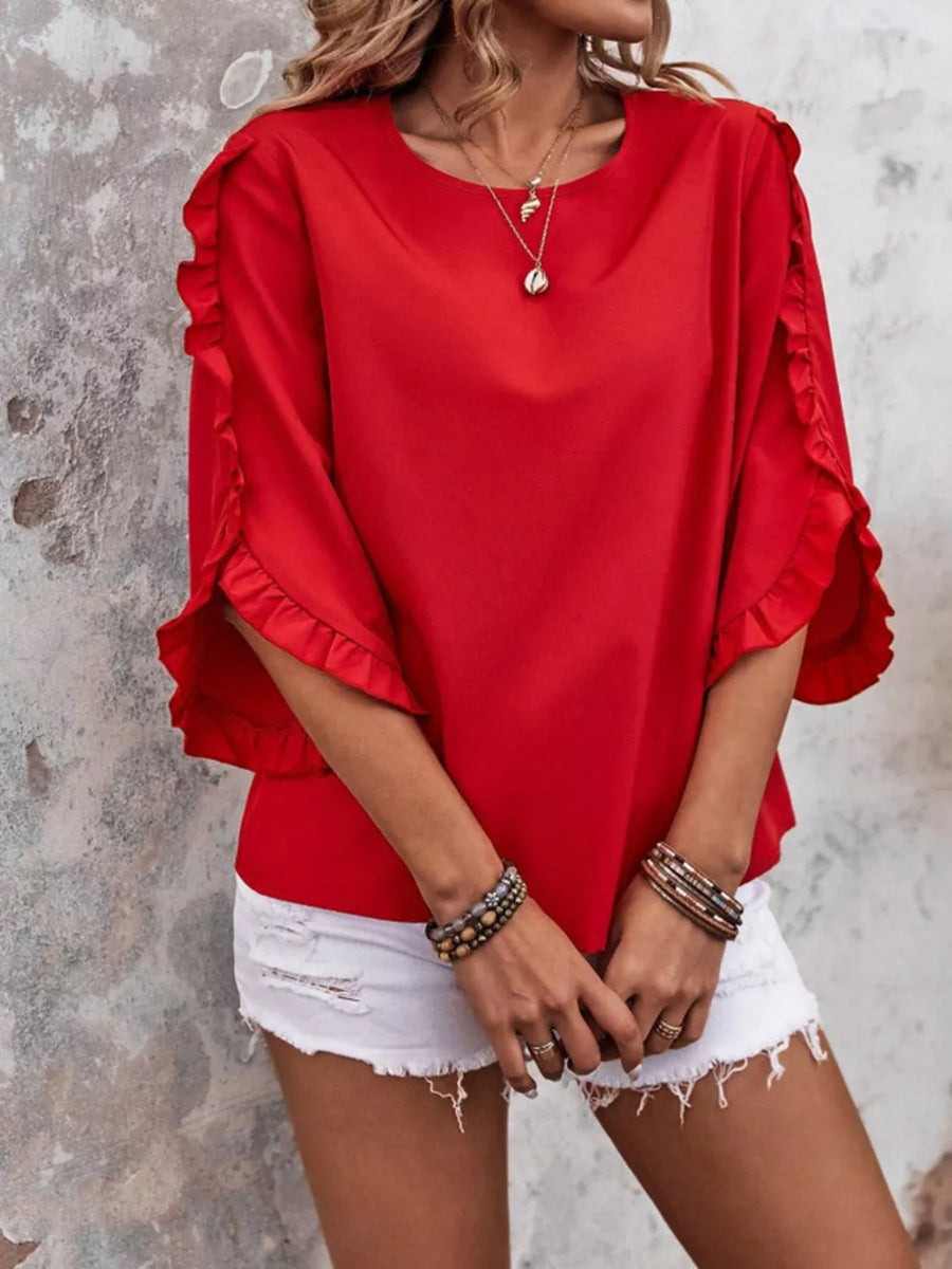 Red ruffled sleeve blouse with button detail and round neckline.