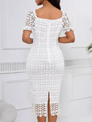 White lace midi dress with short sleeves, square neckline, and a slit.