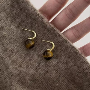 Tiger' earrings in Gold with drop silhouette